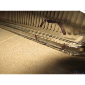 Стекло фары Volvo FH12 NEW правое с резинкой и крепл. (уценка)