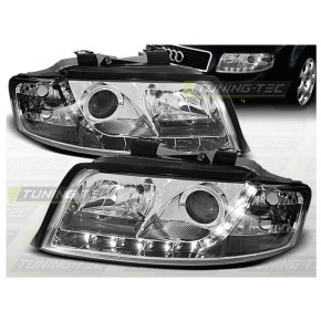 Тюнинг - комплект линзованных фар с дхо Audi A4 B6